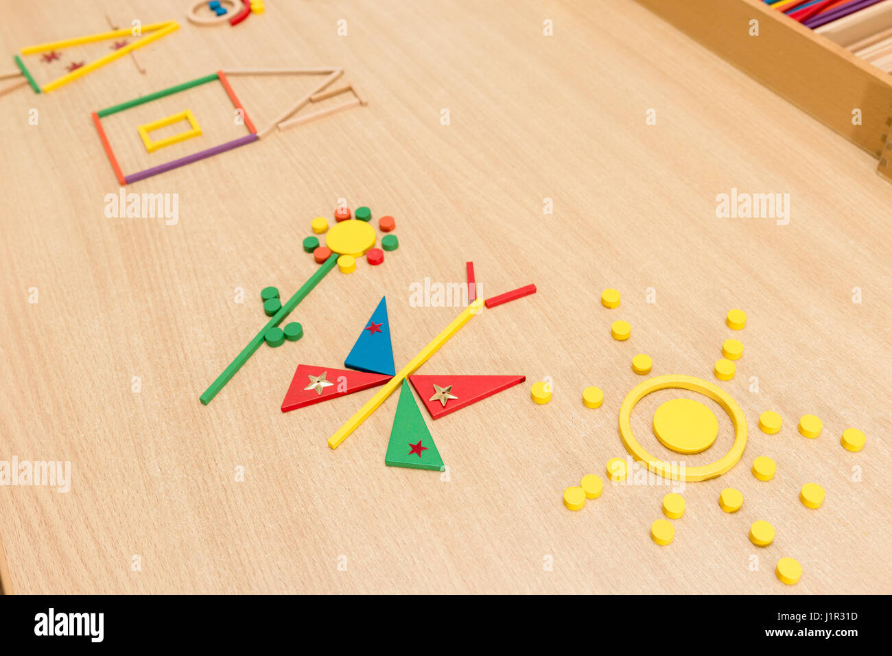 colored sticks for folding figures for children's development Stock Photo
