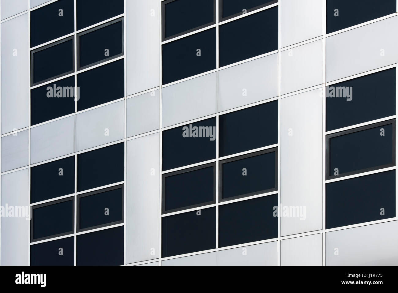 Dark office windows abstract. Milton Keynes, Buckinghamshire, England Stock Photo