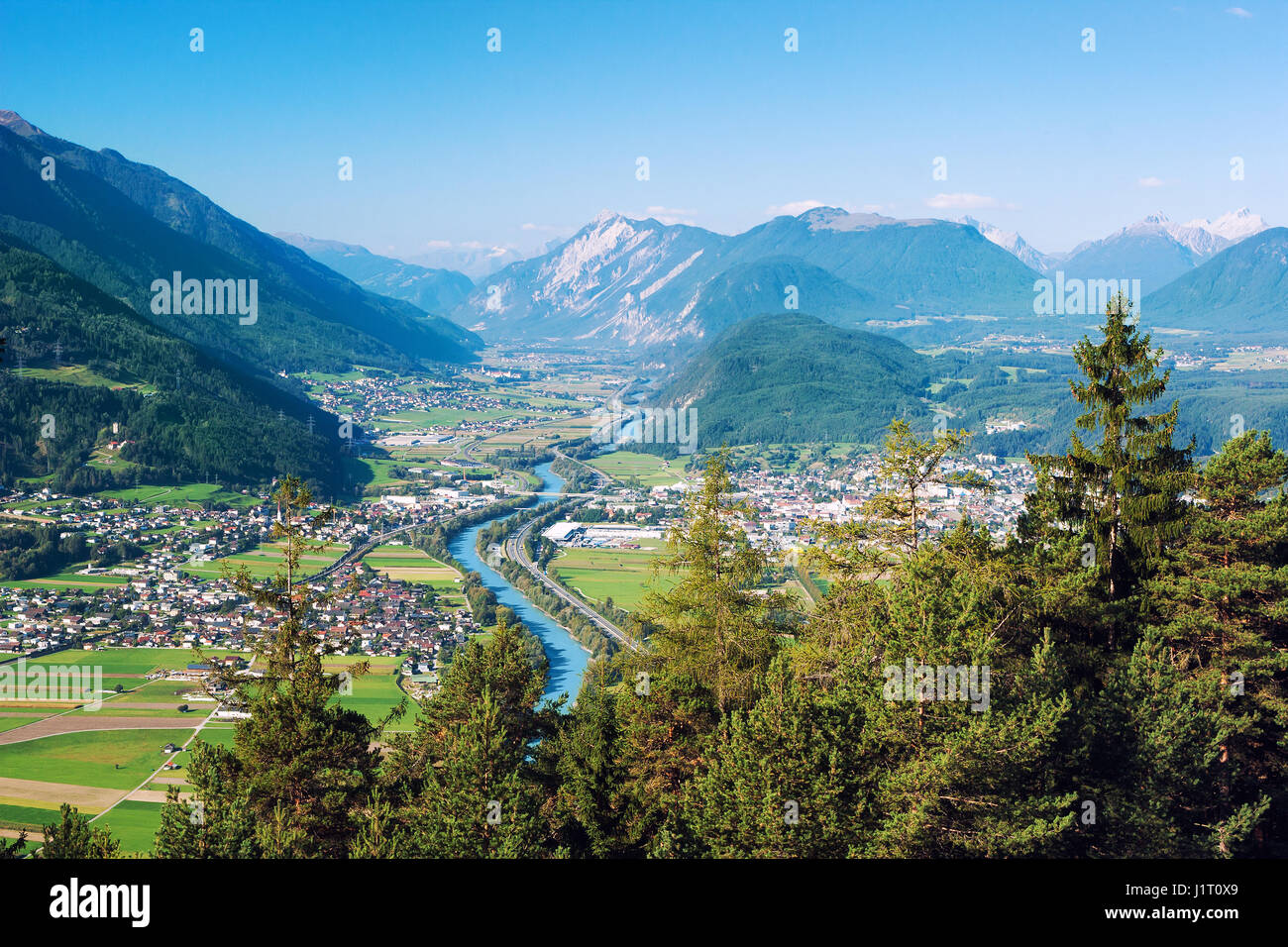 Panoramic bird's eye view of the cities Rietz, Telfs, Pfaffenhofen and the river Inn in Tyrol, Austria (Europe). Stock Photo