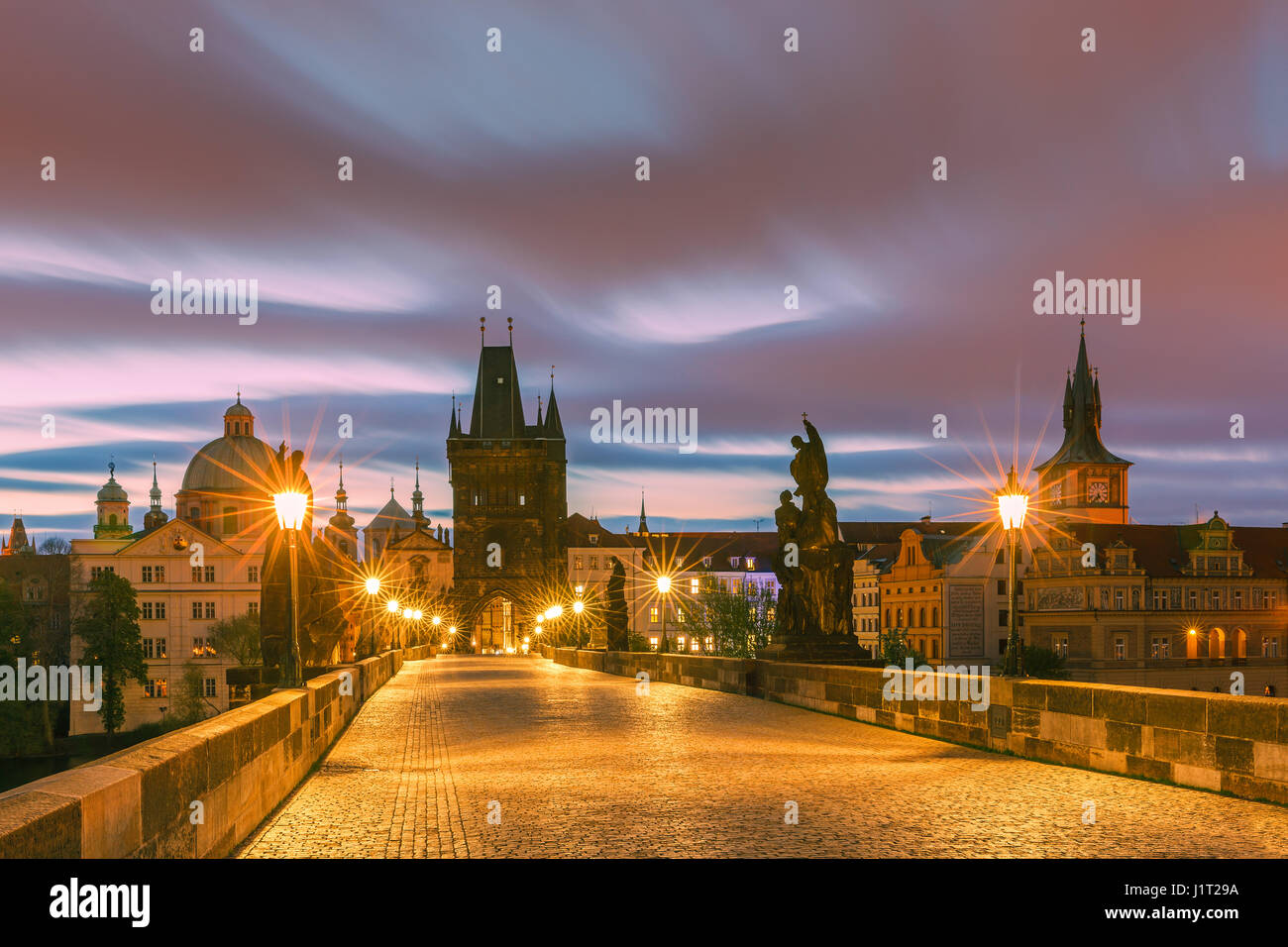 The famous Charles Bridge at sunrise in Prague in the Czech Republic Stock Photo