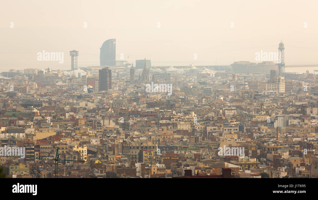Smog over urban landscape of Barcelona, Spain Stock Photo