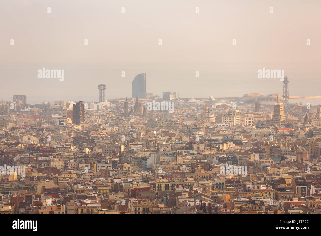 Smog over urban landscape of Barcelona, Spain Stock Photo