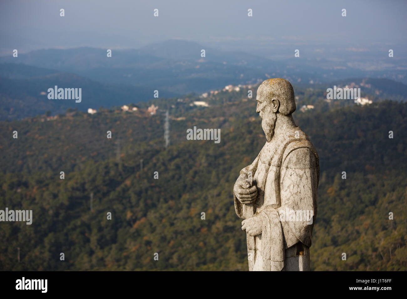 Statue on Tibidabo hill over the Barcelona city Stock Photo