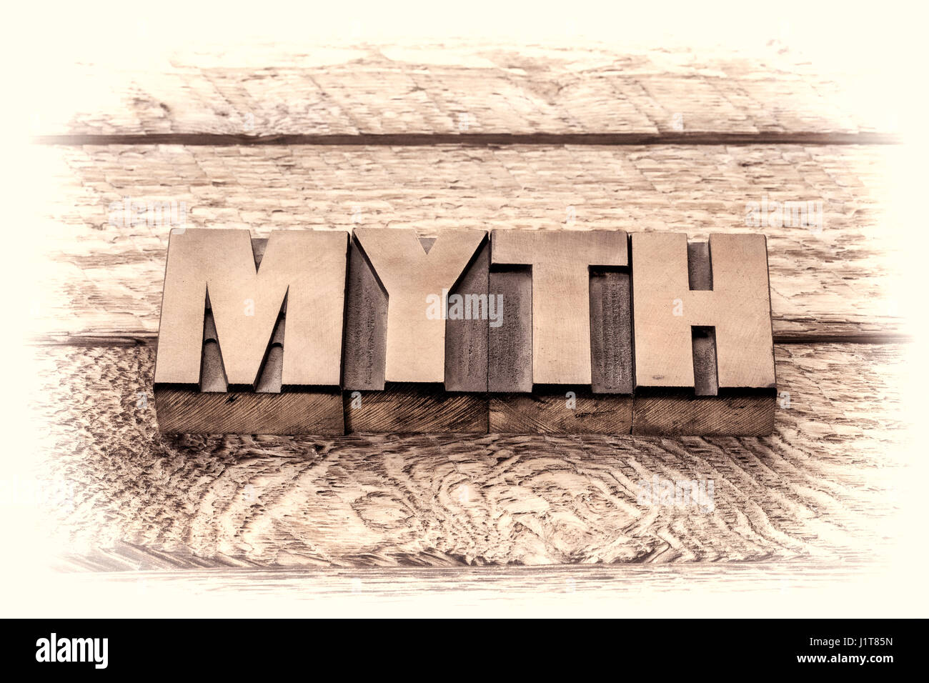 myth word in vintage letterpress wood type, sepia toning Stock Photo