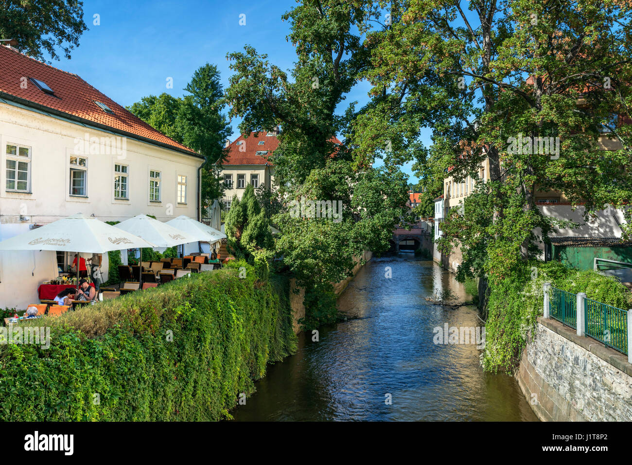 Cafe on the Certovka canal (Devils Stream) from Kampa Island, Mala Strana, Prague, Czech Republic Stock Photo