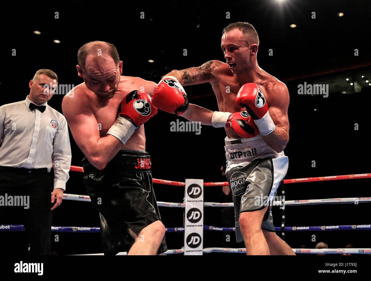 Steve Brogan (left) in action against Henry James in a Super-Lightweight contest at Liverpool Echo Arena. Stock Photo