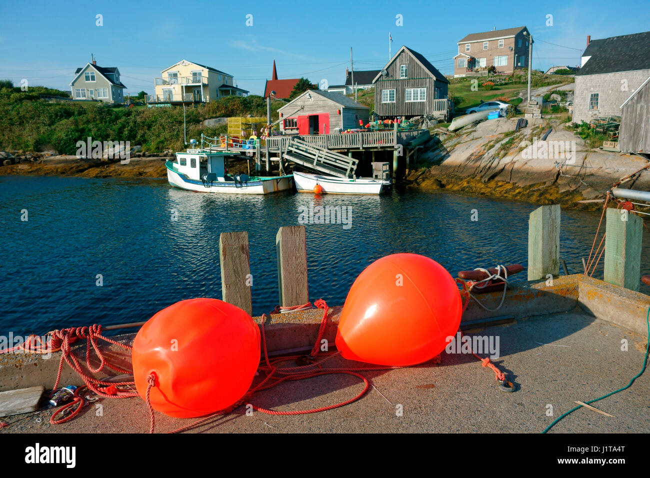 Peggy's Cove, Nova Scotia, Canada showing lobster boats and fish shacks