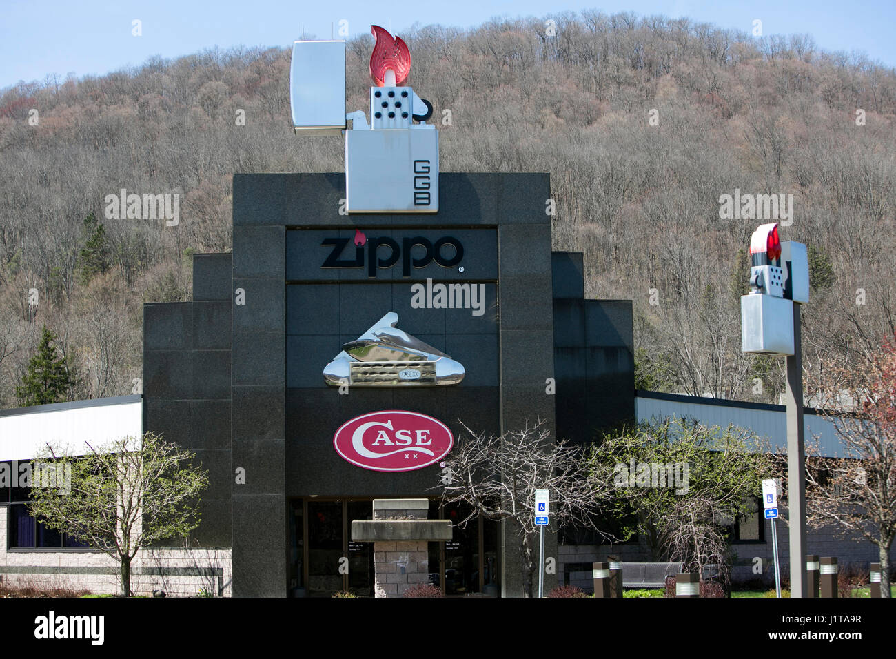 A logo sign outside of the Zippo/Case visitors center of the Zippo Manufacturing Company, maker of Zippo lighters, in Bradford, Pennsylvania on April  Stock Photo