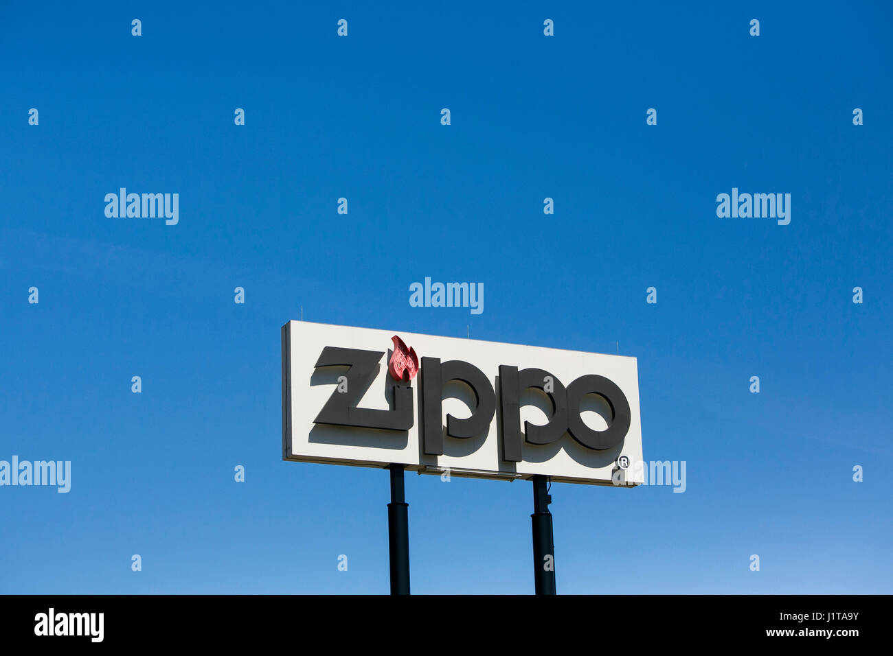 A logo sign outside of the Zippo/Case visitors center of the Zippo Manufacturing Company, maker of Zippo lighters, in Bradford, Pennsylvania on April  Stock Photo