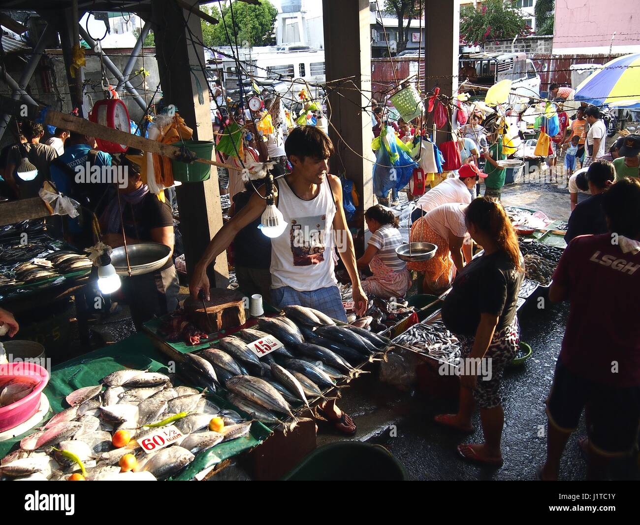ANTIPOLO CITY, PHILIPPINES APRIL 18, 2017 A wet market vendor sells