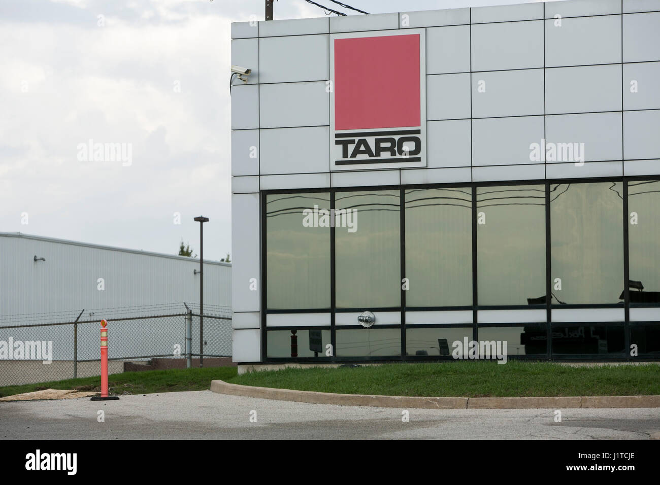 A logo sign outside of a facility occupied by Taro Pharmaceutical Industries in Brampton, Ontario, Canada, on April 16, 2017. Stock Photo