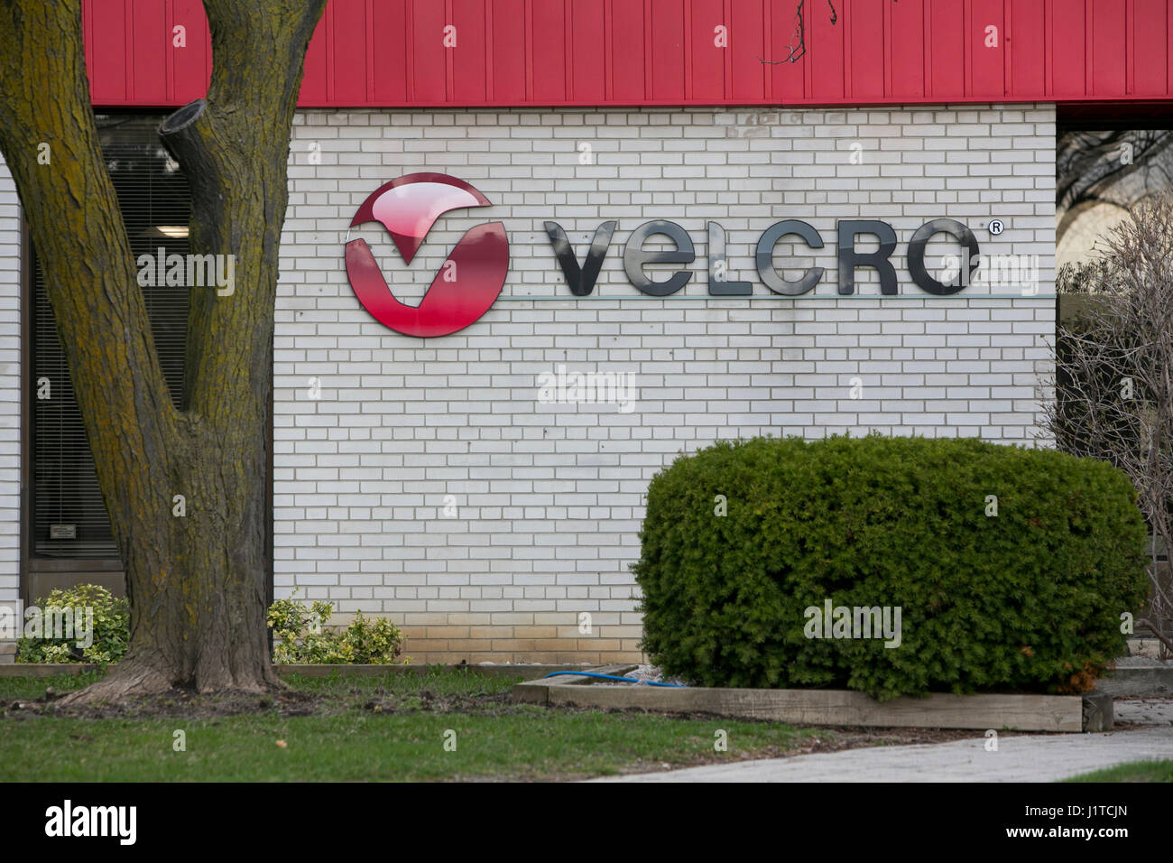 A logo sign outside of a facility occupied by the Velcro Companies in Brampton, Ontario, Canada, on April 16, 2017. Stock Photo