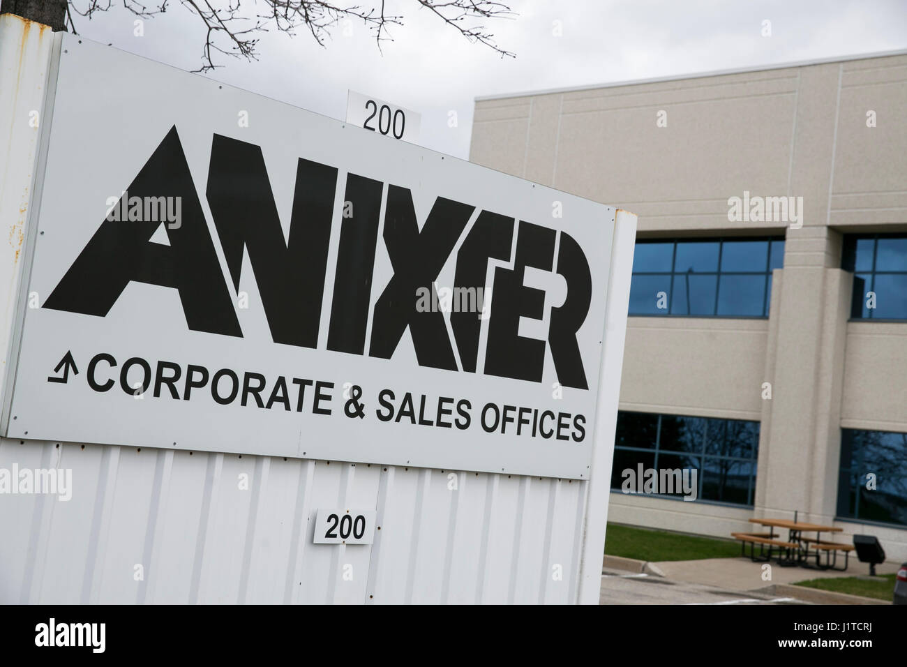 A logo sign outside of a facility occupied by Anixter, Inc., in ...