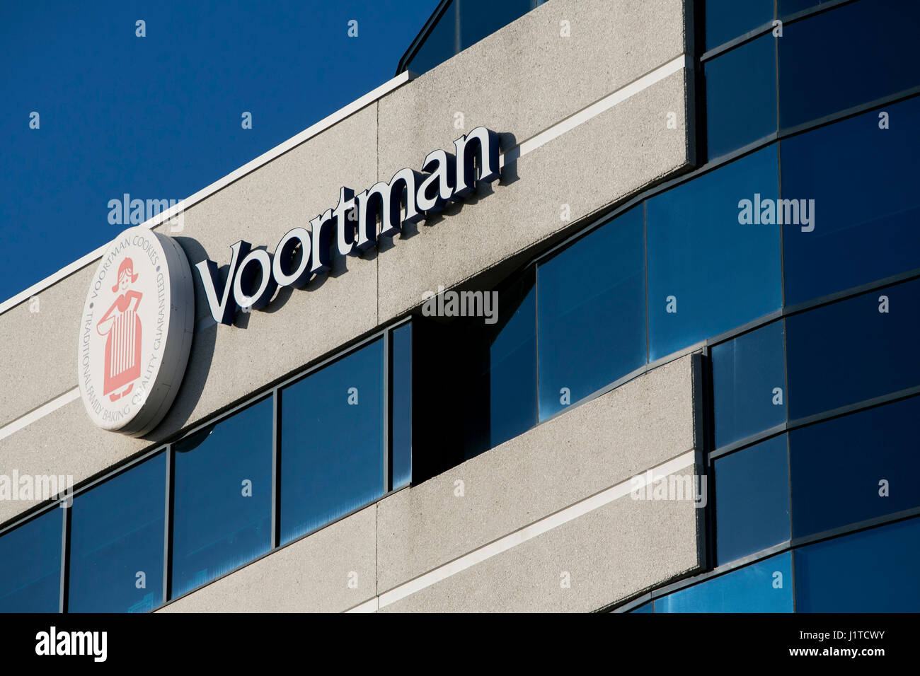 A logo sign outside of the headquarters of Voortman Cookies Limited in ...