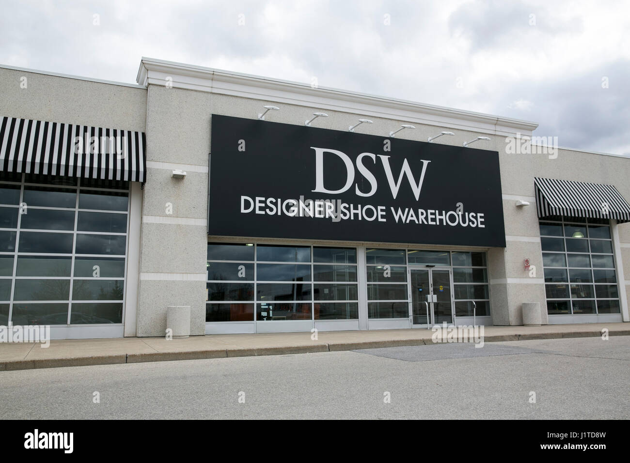 A logo sign outside of a DSW Designer Shoe Warehouse retail store in Mississauga, Ontario, Canada, on April 16, 2017. Stock Photo