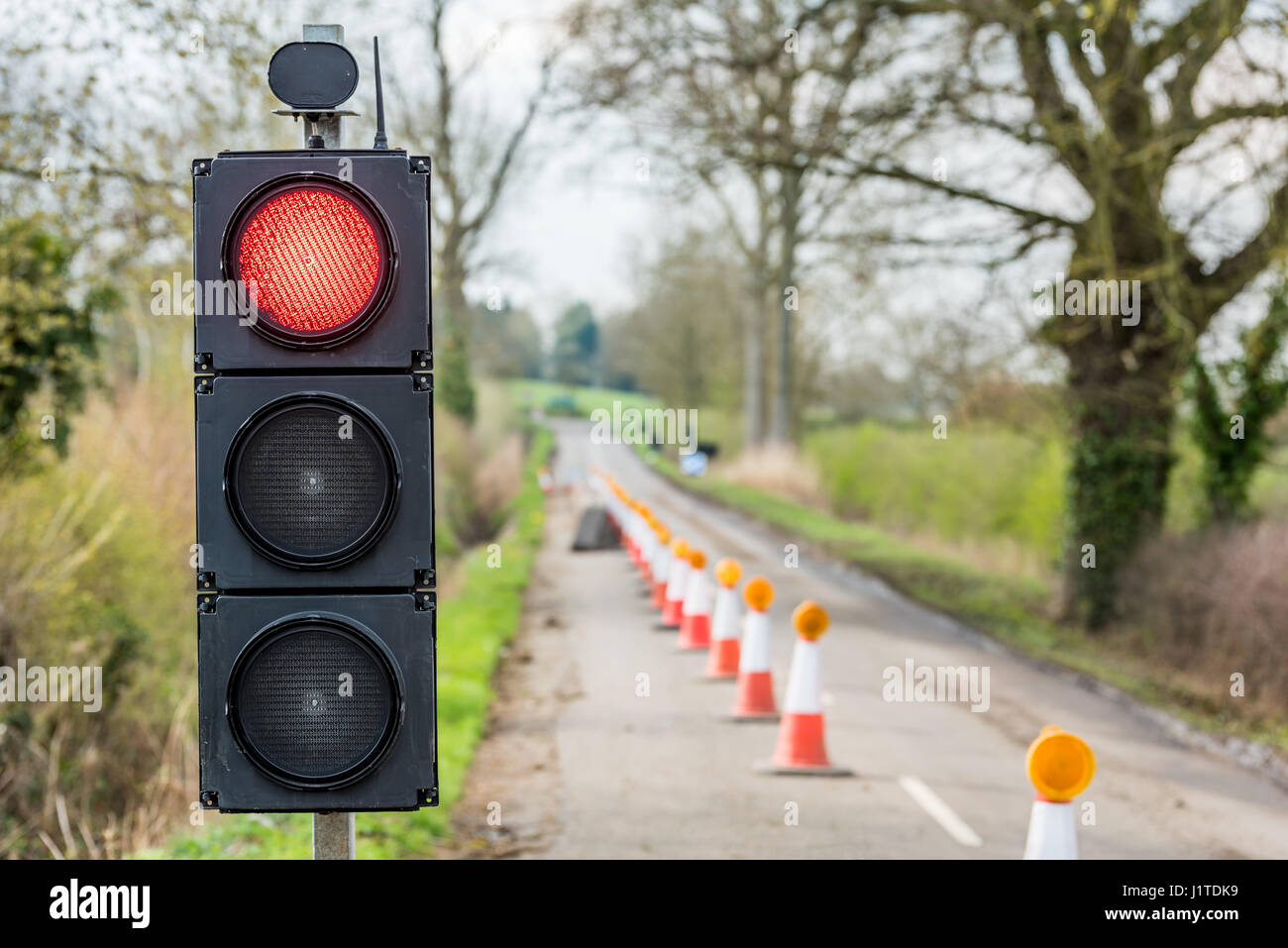 UK Motorway Roadworks Red Traffic Lights Cones Stock Photo - Alamy