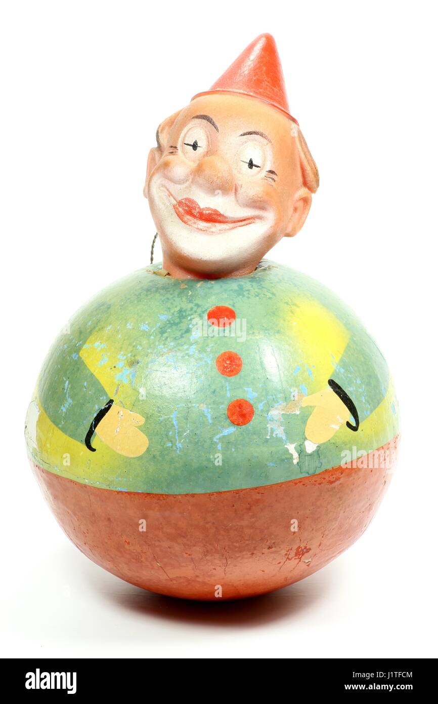 antique roly-poly doll isolated on white background Stock Photo - Alamy