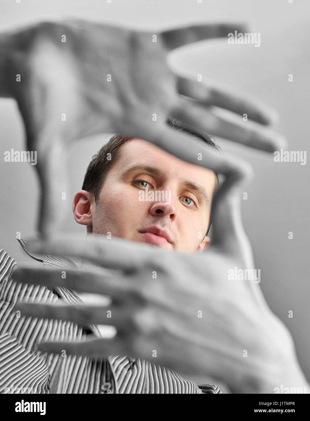 Man with black and white hand gesture Stock Photo - Alamy