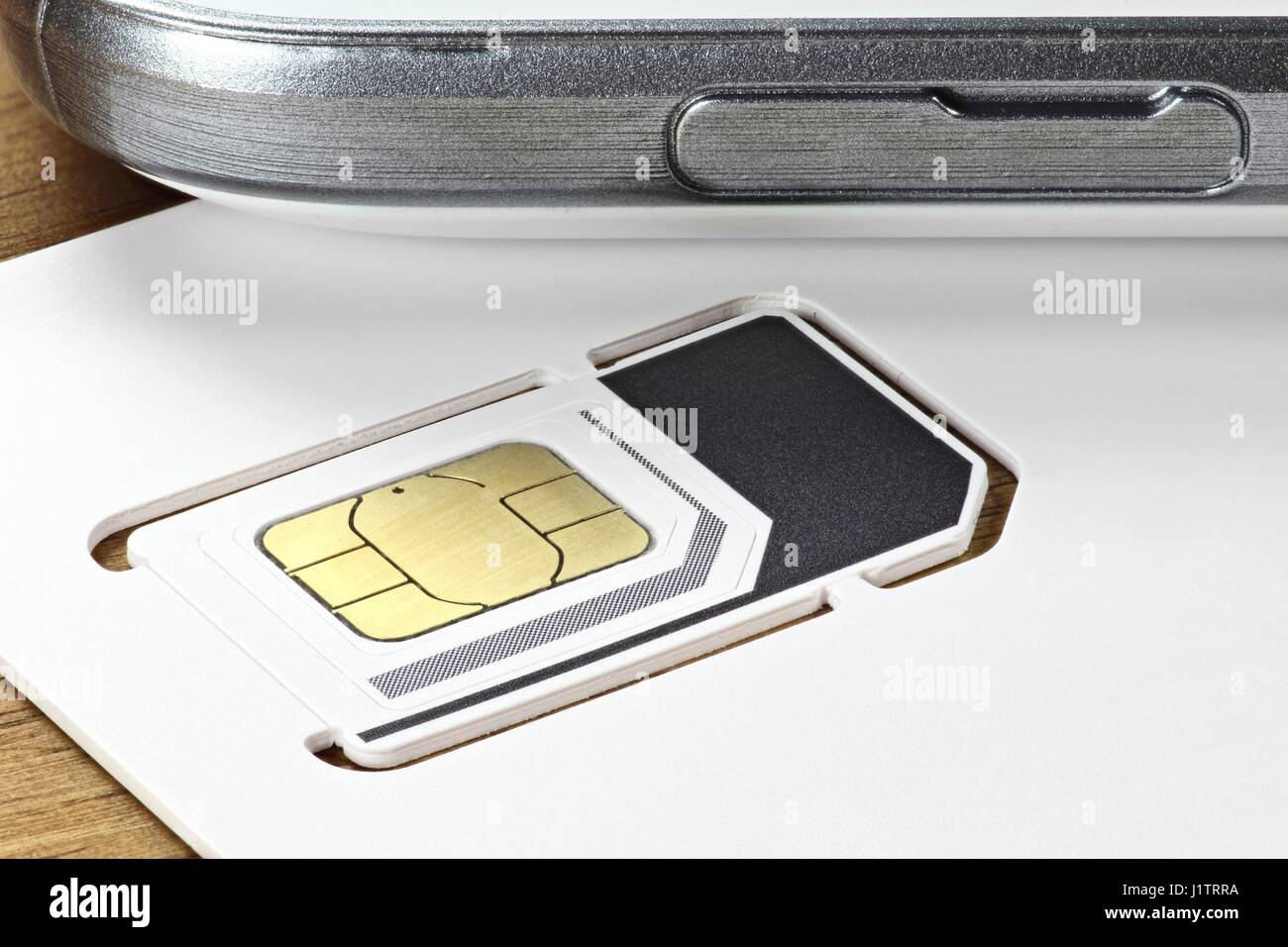triple SIM card for mobile communication Stock Photo