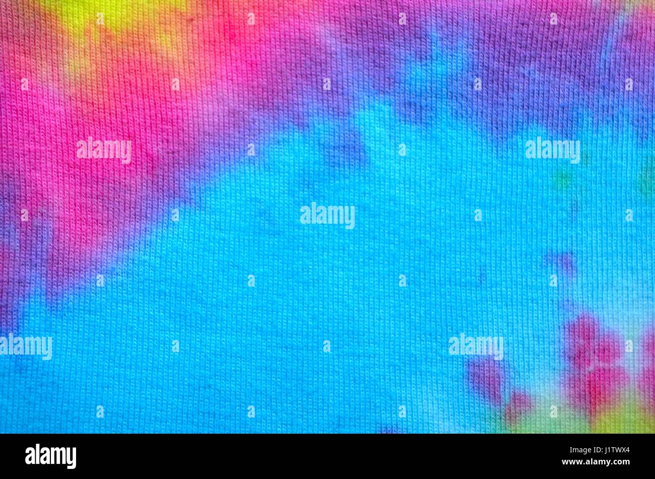 Tie-Dye fabric zoom in brilliant vibrant colors colours Stock Photo