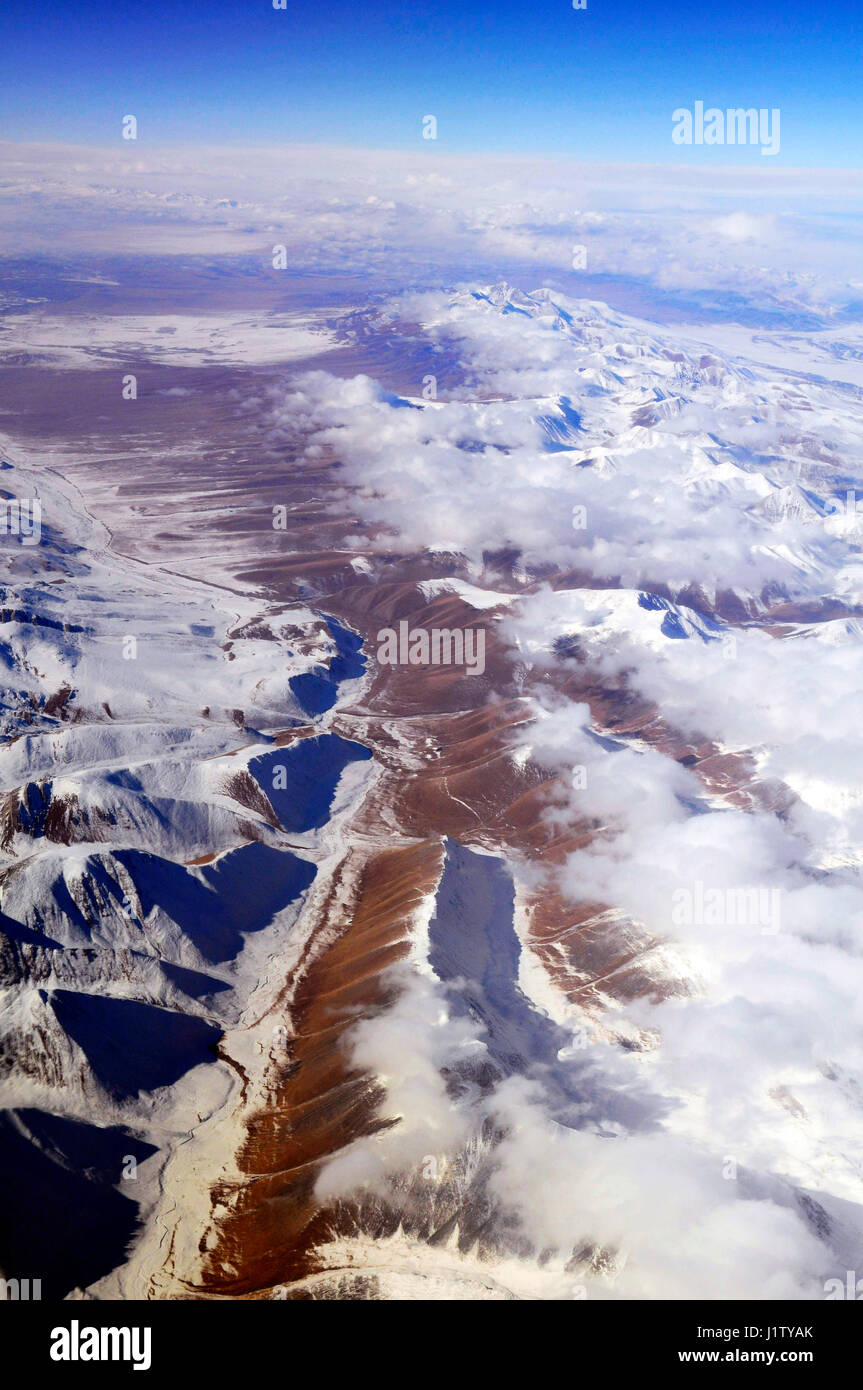 Dramatic aerial views of the Tian Shan mountain range in Xinjiang, China. Stock Photo