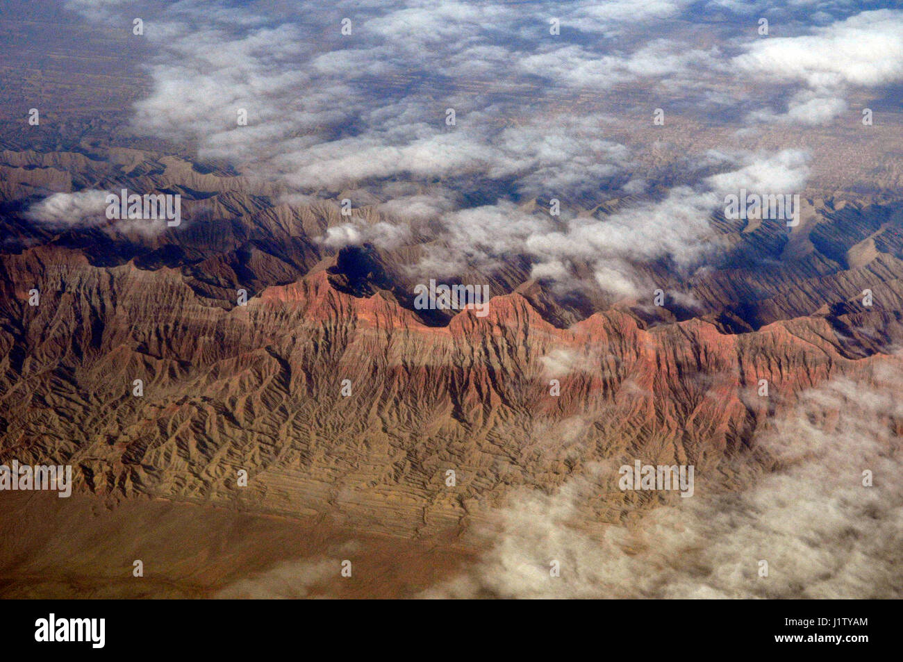Dramatic aerial views of the Tian Shan mountain range in Xinjiang, China. Stock Photo