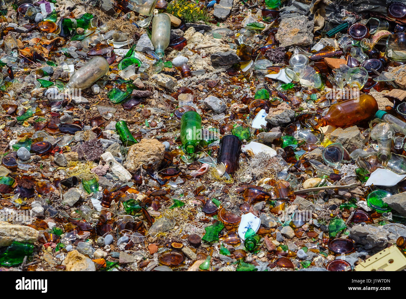 Rubbish tip, garbage, with broken glass, plastic and rusty metal, Greece Stock Photo
