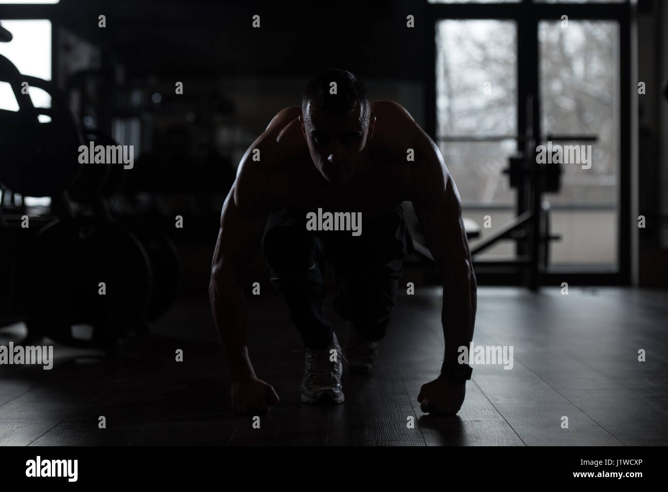 Man kneeling silhouette hi-res stock photography and images - Alamy