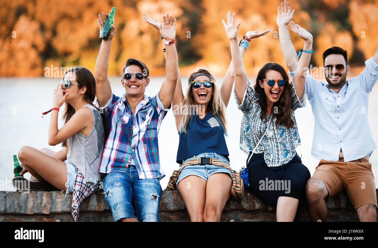 Group of friends having fun outdoors and are happy Stock Photo - Alamy