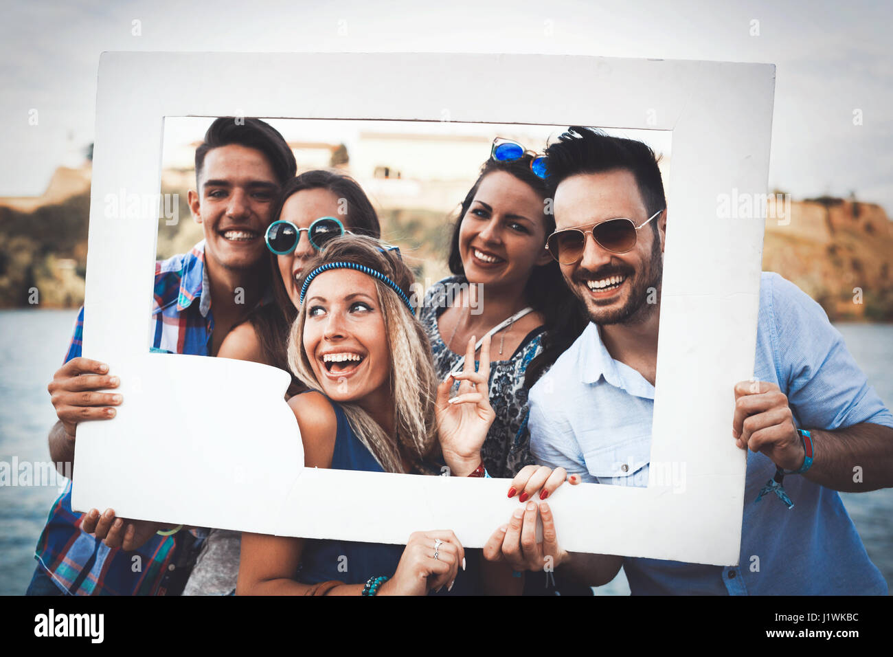 Group of friends having fun outdoors and are happy Stock Photo - Alamy