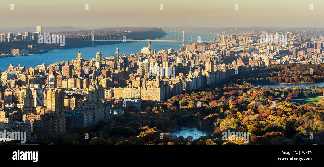 Panoramic elevated view of Central Park, Upper West Side and the George Washington Bridge with Hudson River in Fall. Manhattan, New York CIty Stock Photo