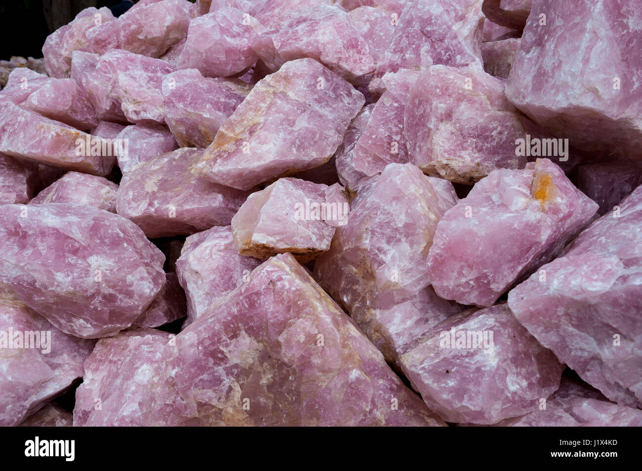 Rose quartz mined near Mzimba, Malawi, by artisanal miners for export mainly to China Stock Photo