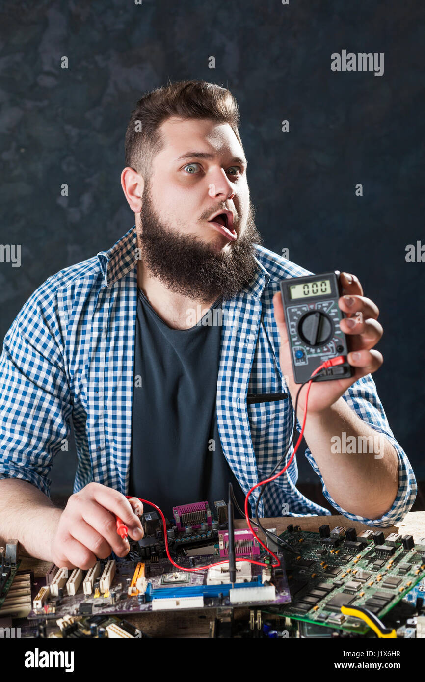 Computer engineer makes laptop board hi-res stock photography and ...