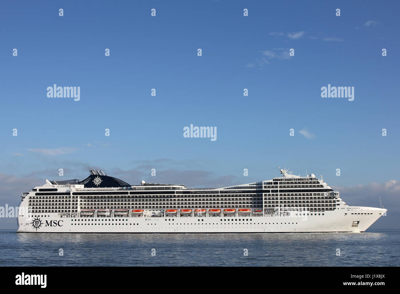 MSC Magnifica on the river Elbe. MSC Magnifica is a Musica class cruise ship operated by MSC Cruises. Stock Photo