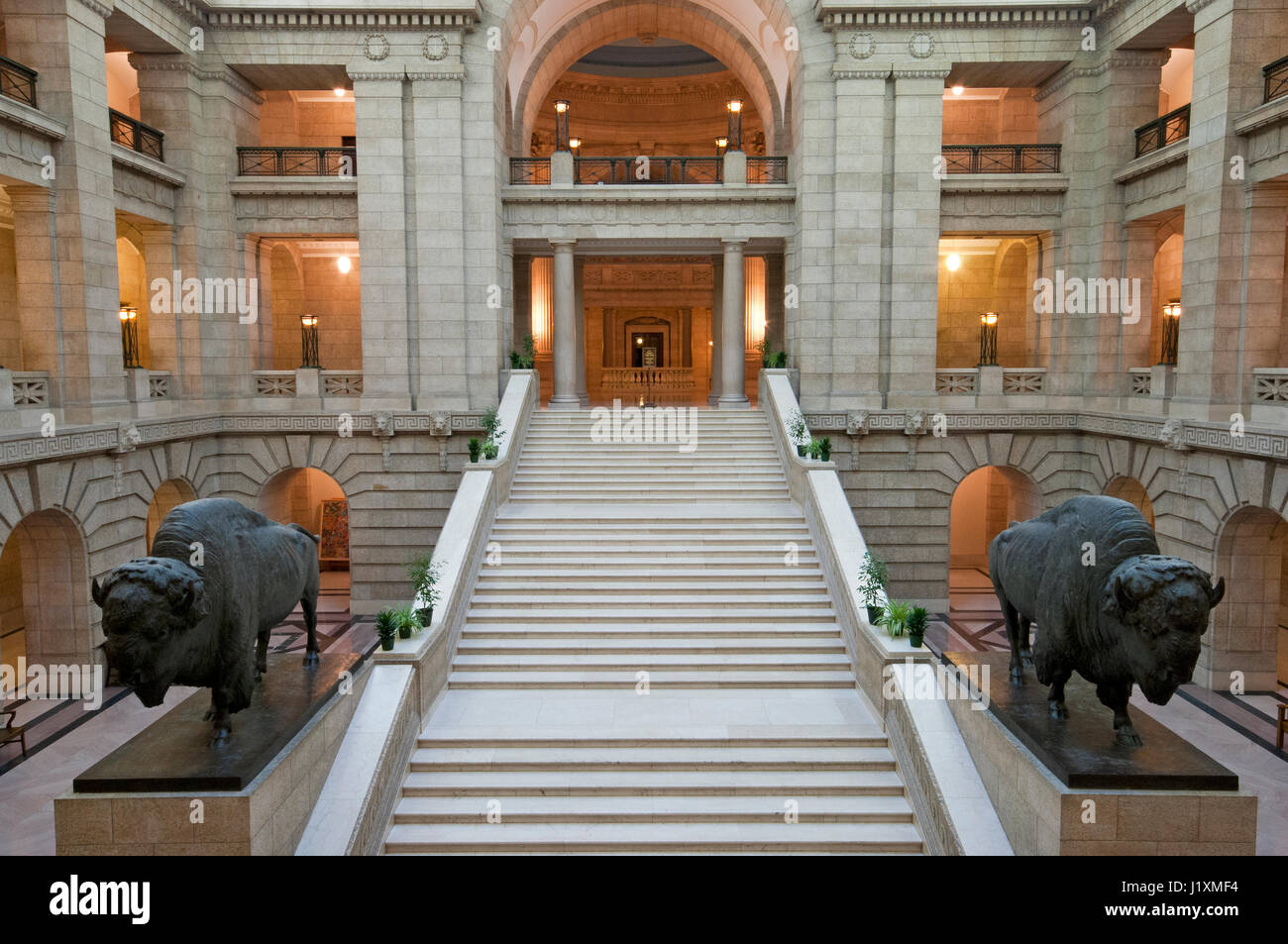 Interior of the Legislative Building with staircase and bronze sculptures of american bison (Bison bison), Winnipeg, Manitoba, Canada Stock Photo