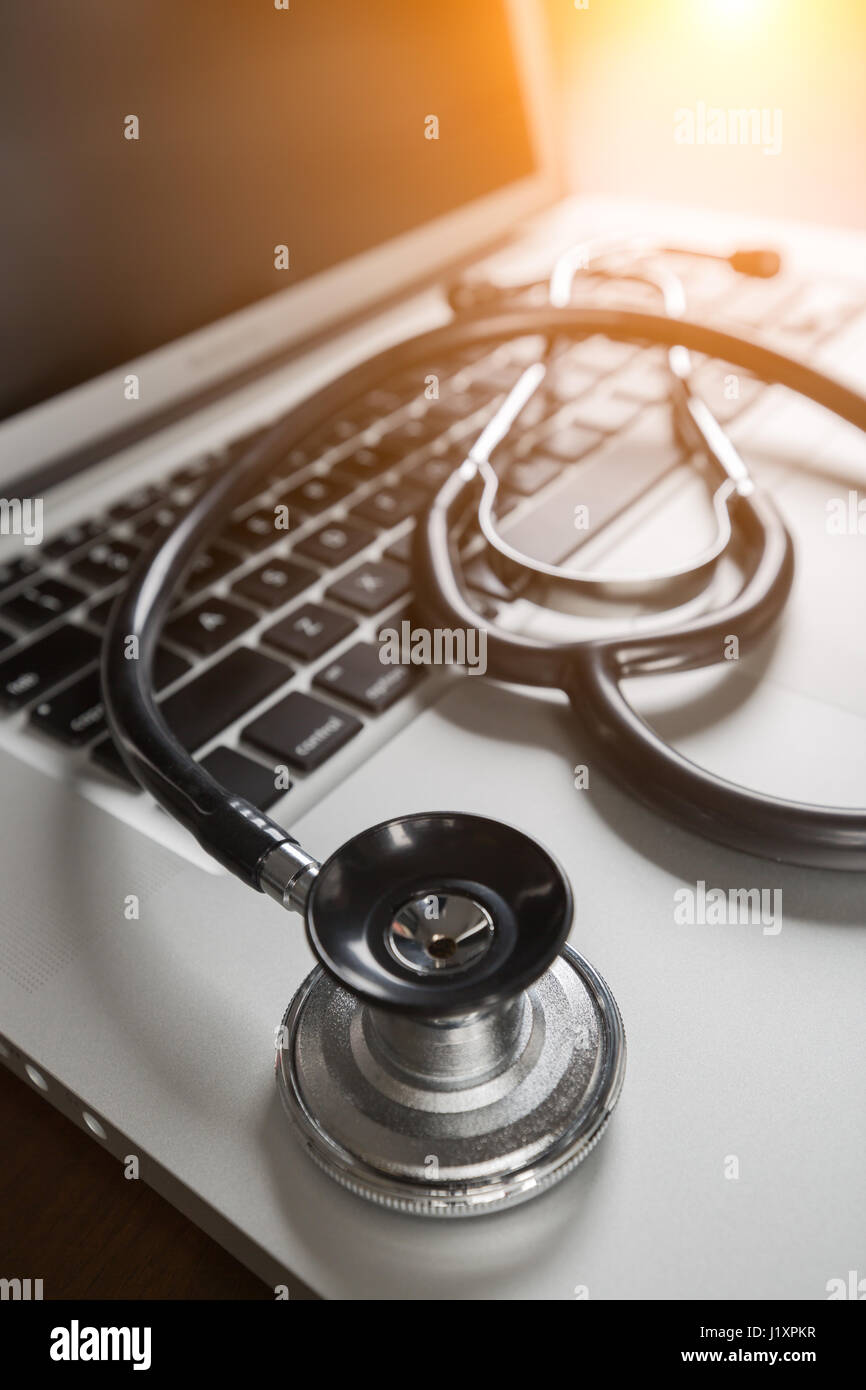 Medical Stethoscope Resting on Laptop Computer Keyboard Stock Photo - Alamy