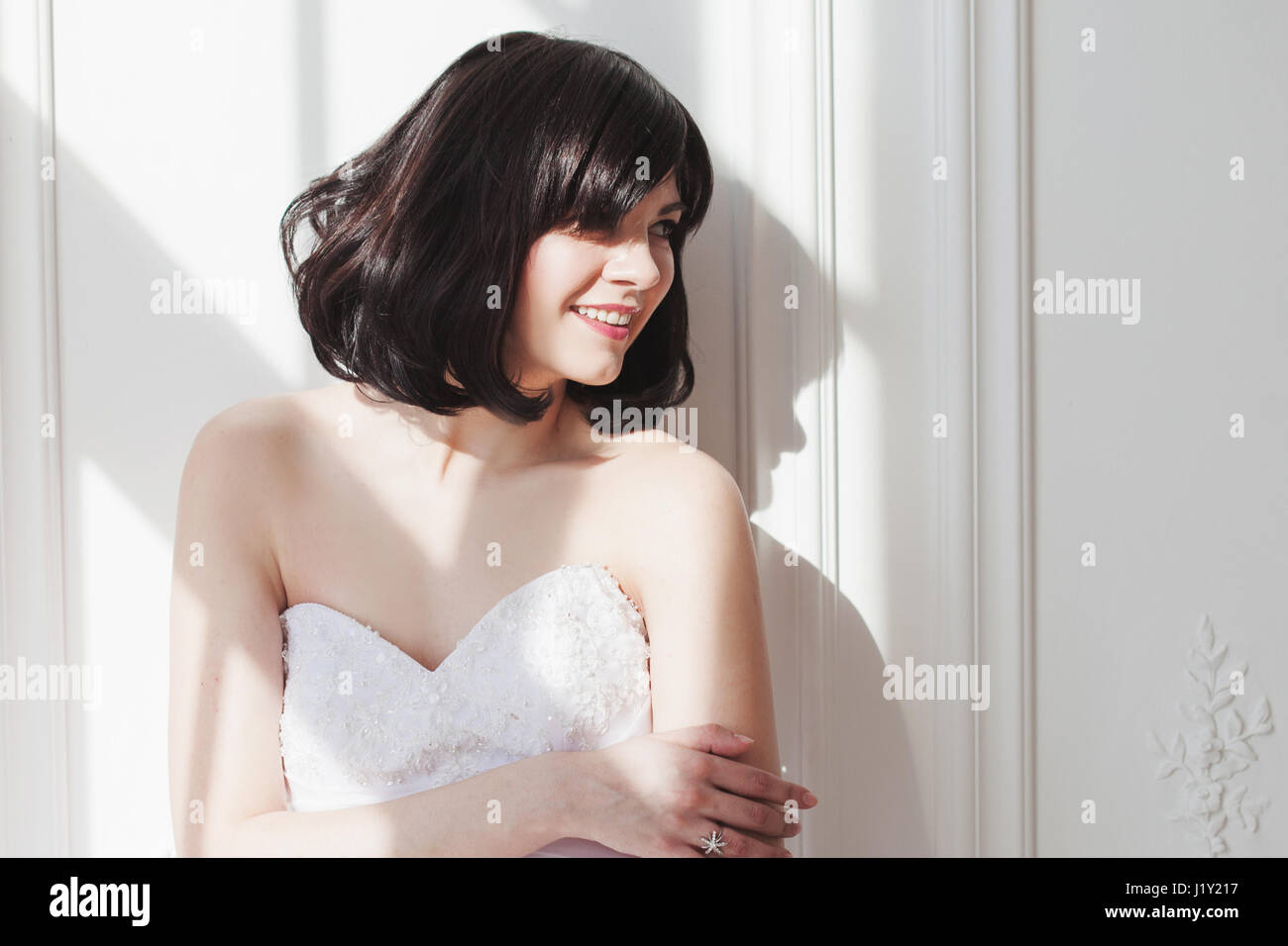 Portrait Of Young Attractive Brunette With Short Hair In A Wedding