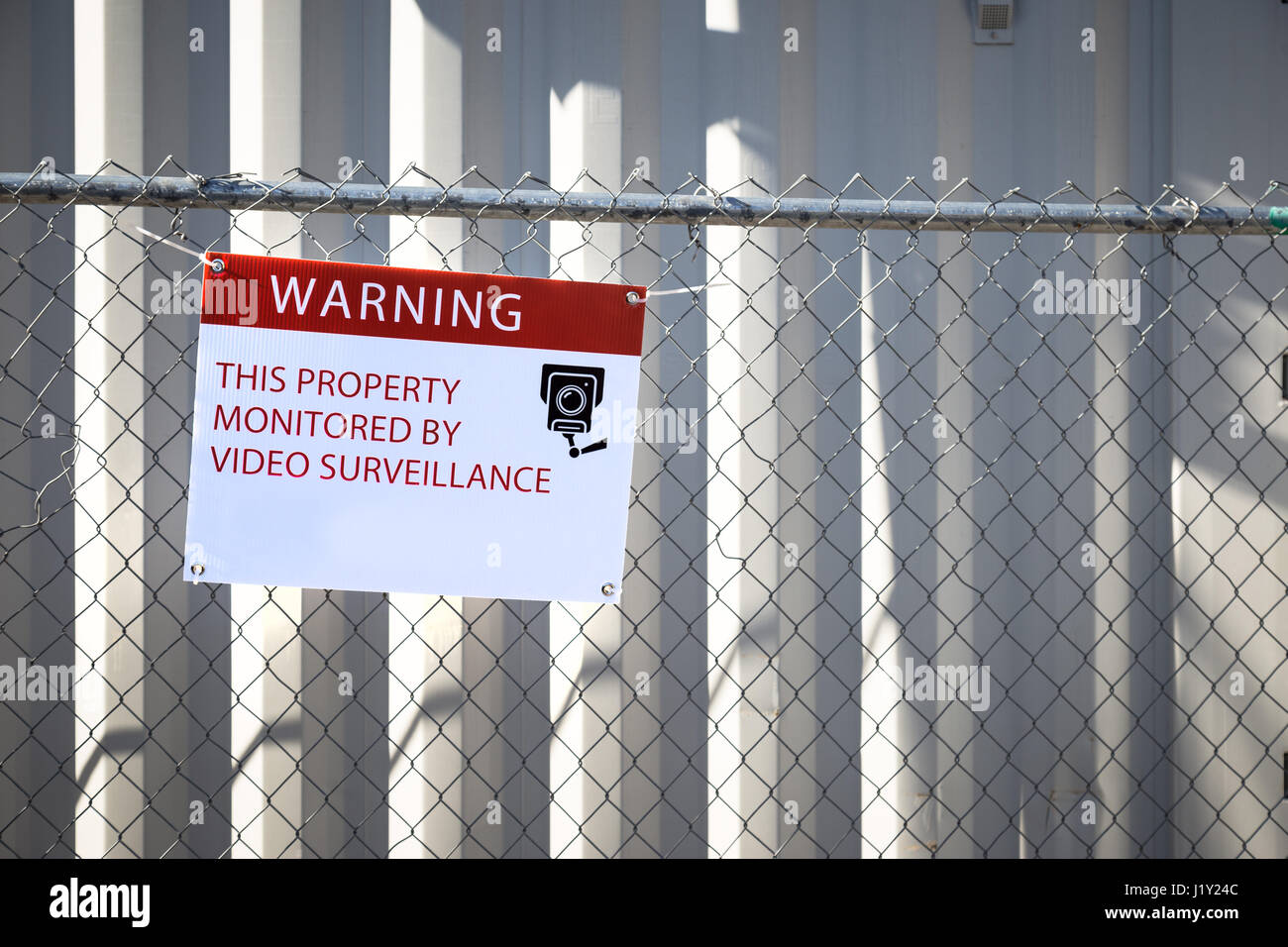 Video surveillance sign outside of a construction site Stock Photo - Alamy
