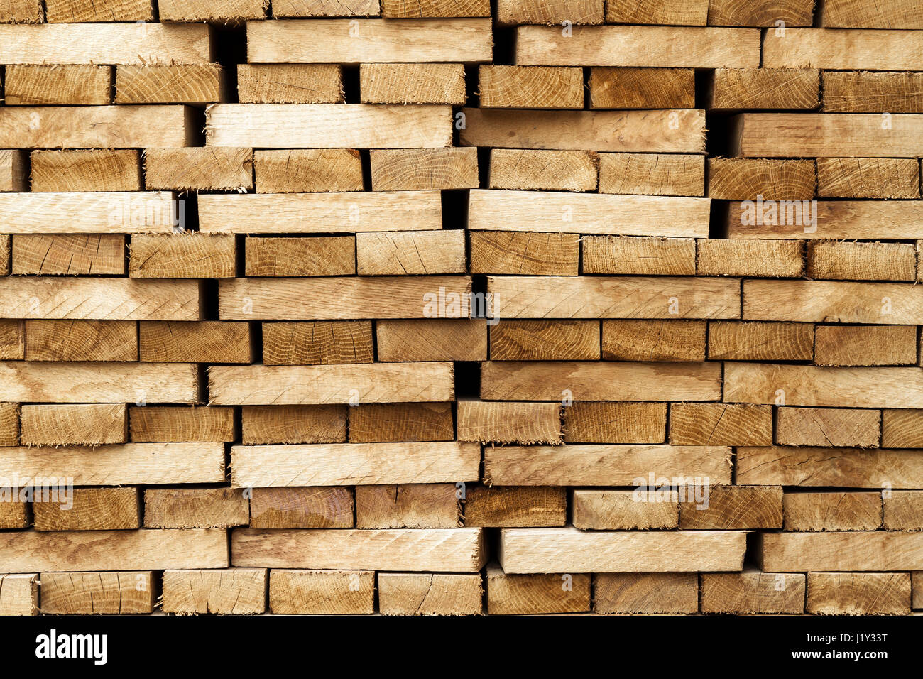 Wood timber construction material background and texture. Stack of