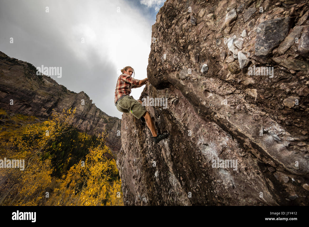 Andrew Merrill bouldering at the Mine boulders near Telluride, CO Stock