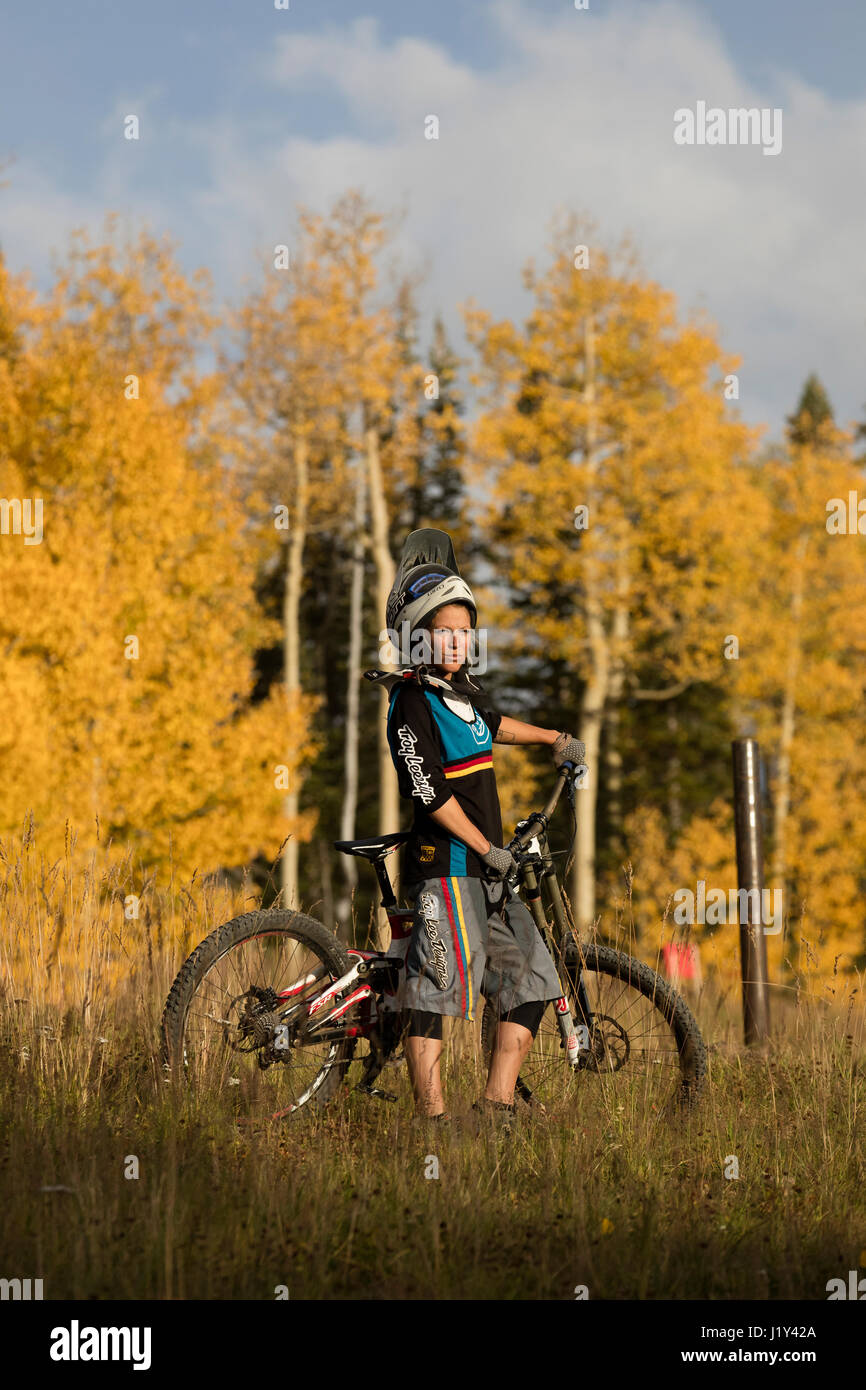 Aurelie Slegers standing with her mountain bike in Telluride, Colorado. Stock Photo