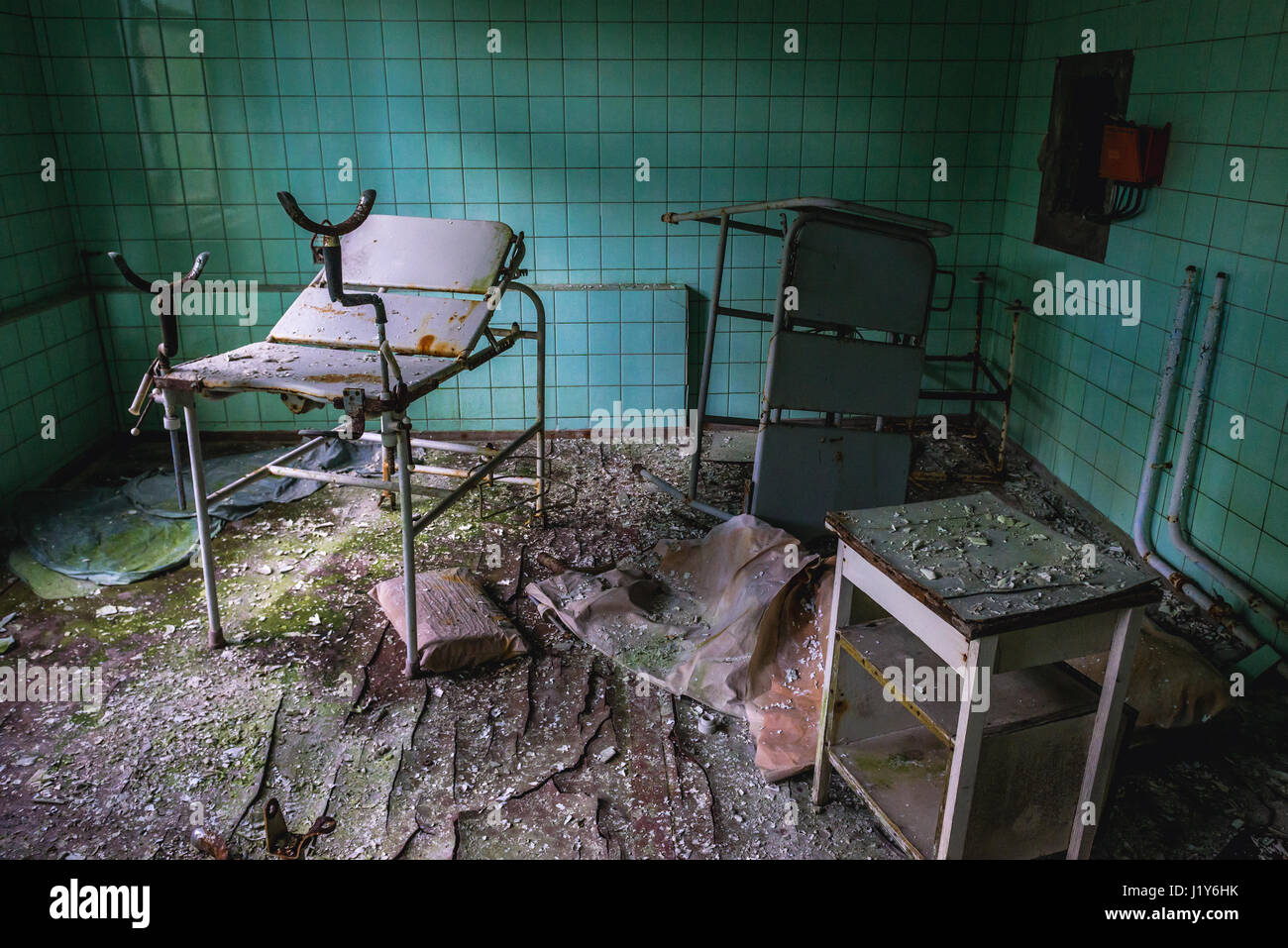 Gynecological chair in Hospital No. 126 of Pripyat ghost city, Chernobyl Nuclear Power Plant Zone of Alienation in Ukraine Stock Photo