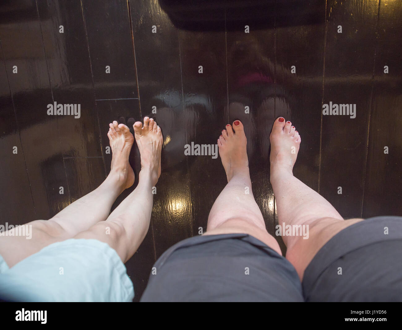 Two women in Japanese  museum without the shoes Stock Photo