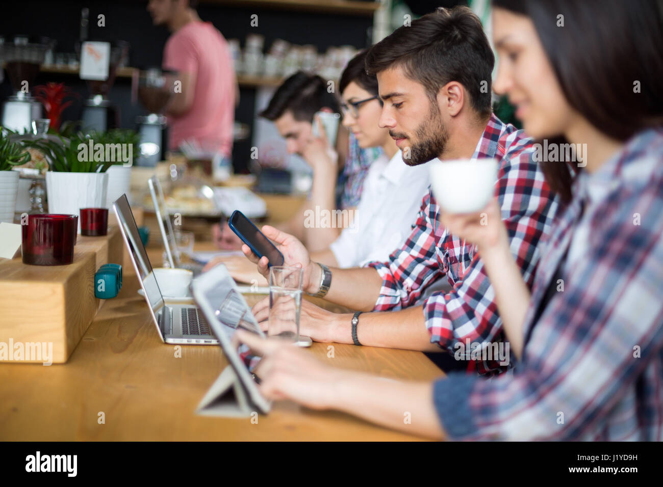 Students learn with a cup of coffee in coffee shop Stock Photo Alamy