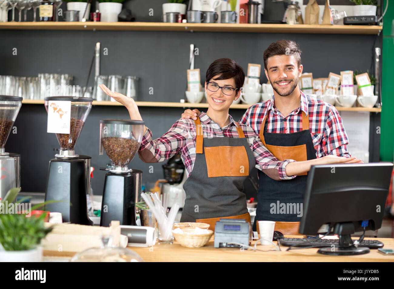 Loyal and attentive happy smiling owners Stock Photo - Alamy