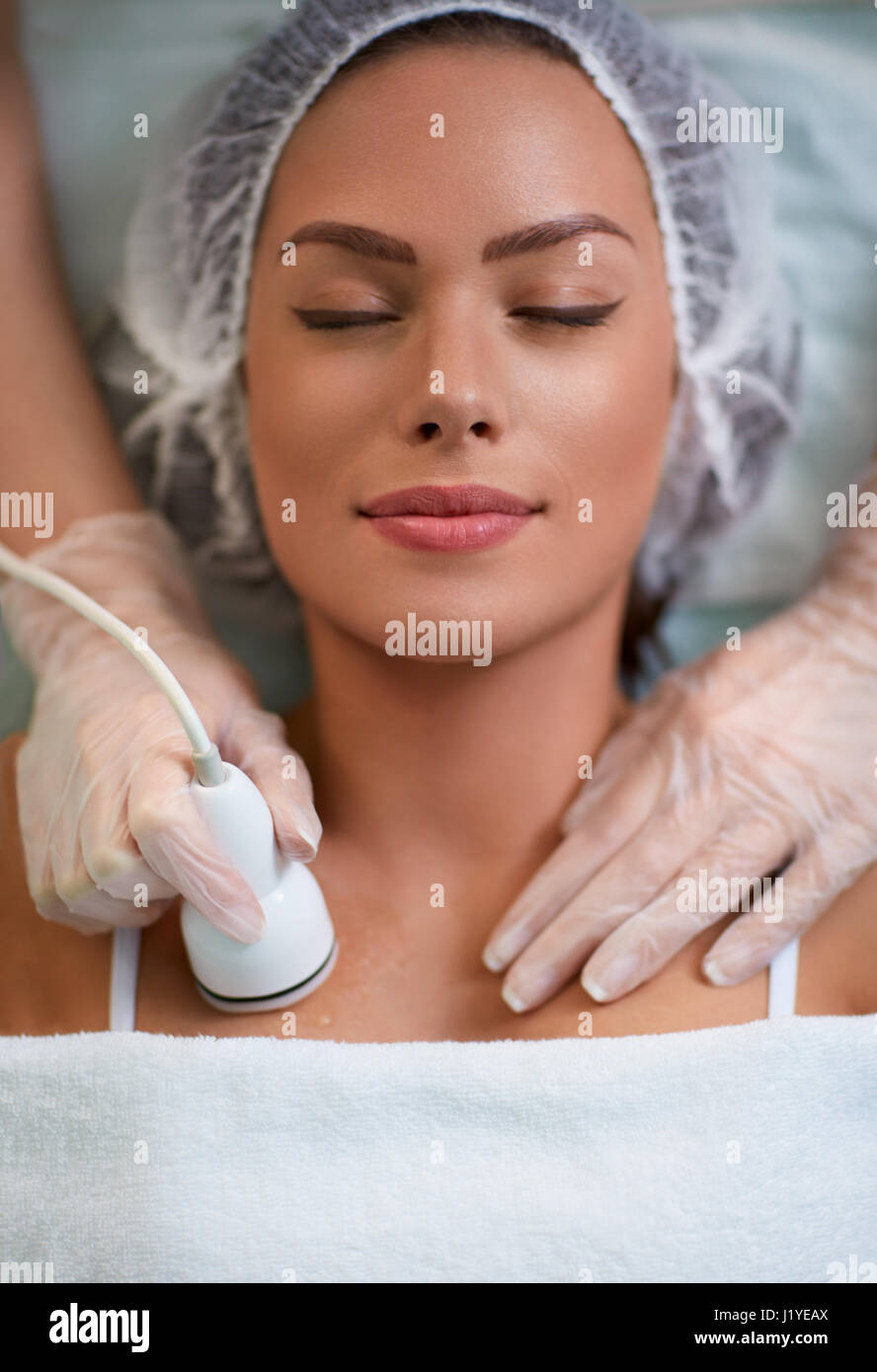 Woman relaxing and enjoying in skin and body care treatment Stock Photo