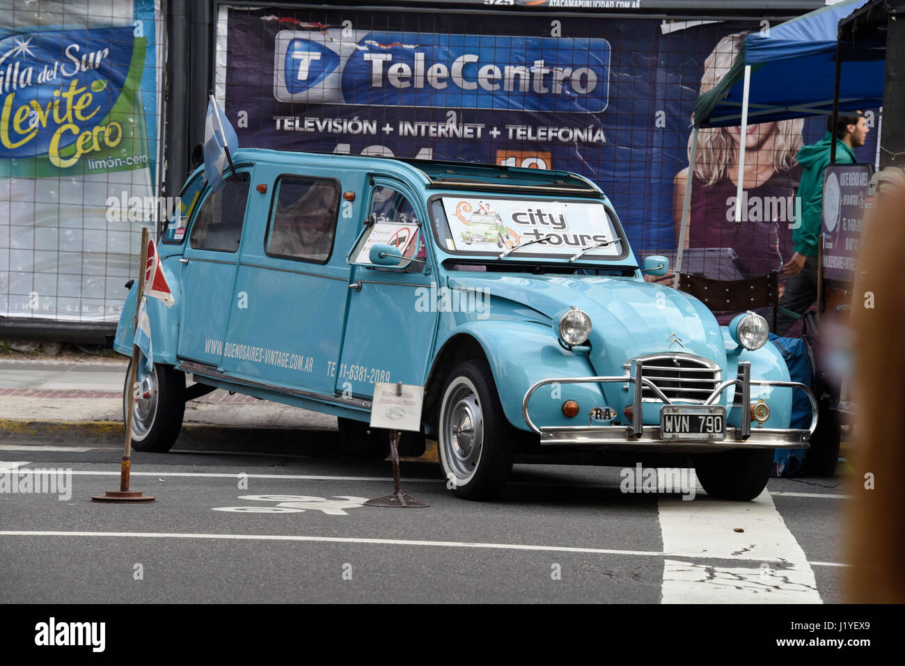 A blue Citroen City Tour car waiting in Caminito, Buenos Aires Stock Photo