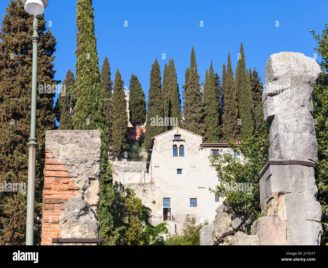 travel to Italy - ruins and building of Museum of Archaeology in Roman Theatre in Verona city in spring Stock Photo