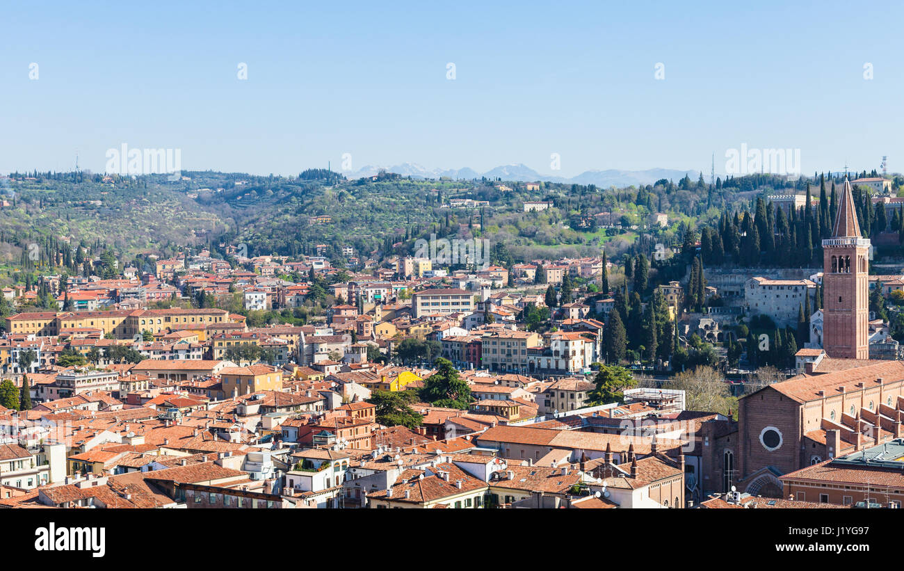 travel to Italy - above view of Verona town with Sant'Anastasia Church from tower Torre dei Lamberti in spring Stock Photo