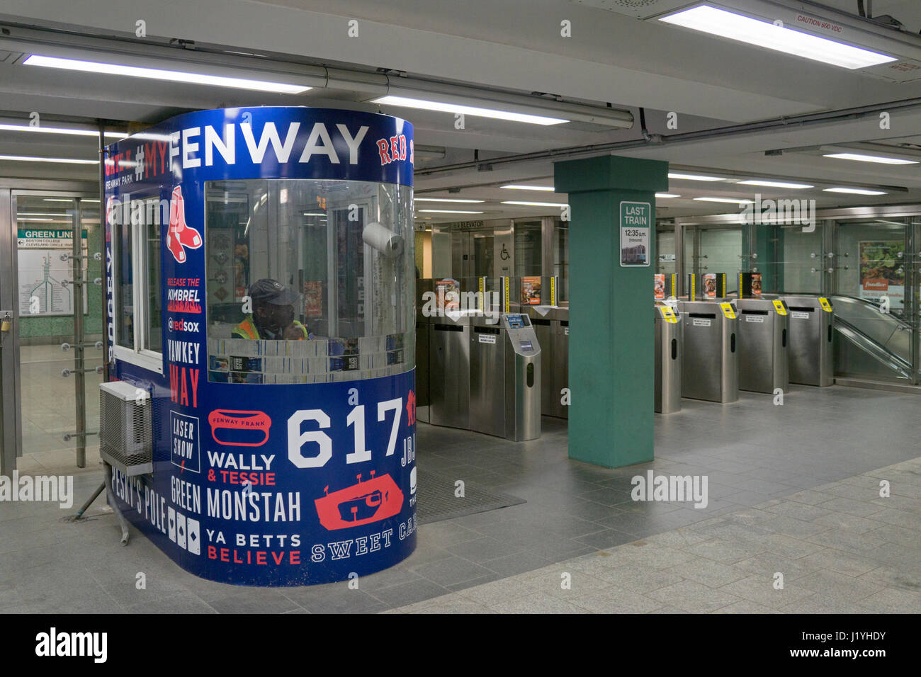 The entrance to the Kenmore light rail station on the MBTA green line. Near Fenway Park the token booth is adorned with Red Sox messages. Stock Photo
